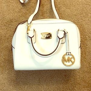 Michael Kors white purse.